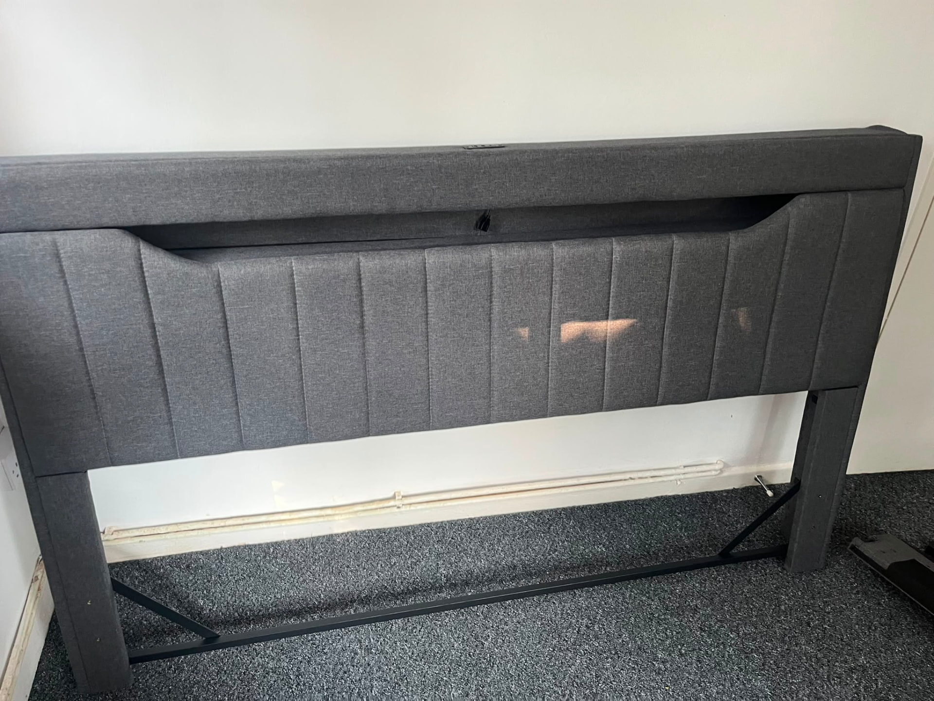 Assembled grey upholstered headboard and bed frame — South Wales furniture assembly