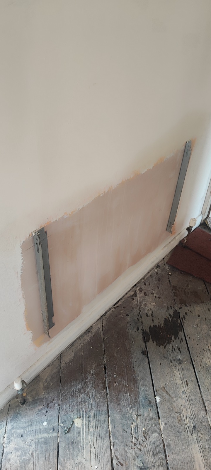 Radiator and floorboard repair mid-job — South Wales property maintenance