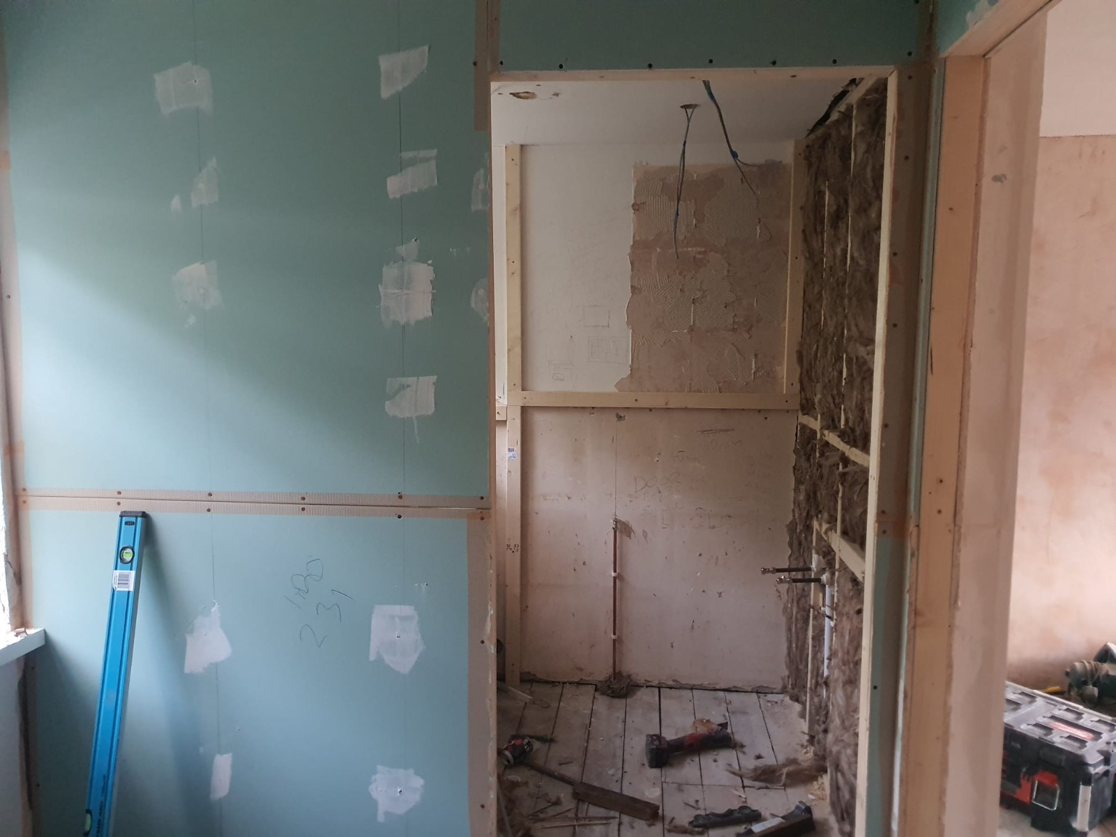 Bathroom walls stripped back ahead of new suite install — Newport
