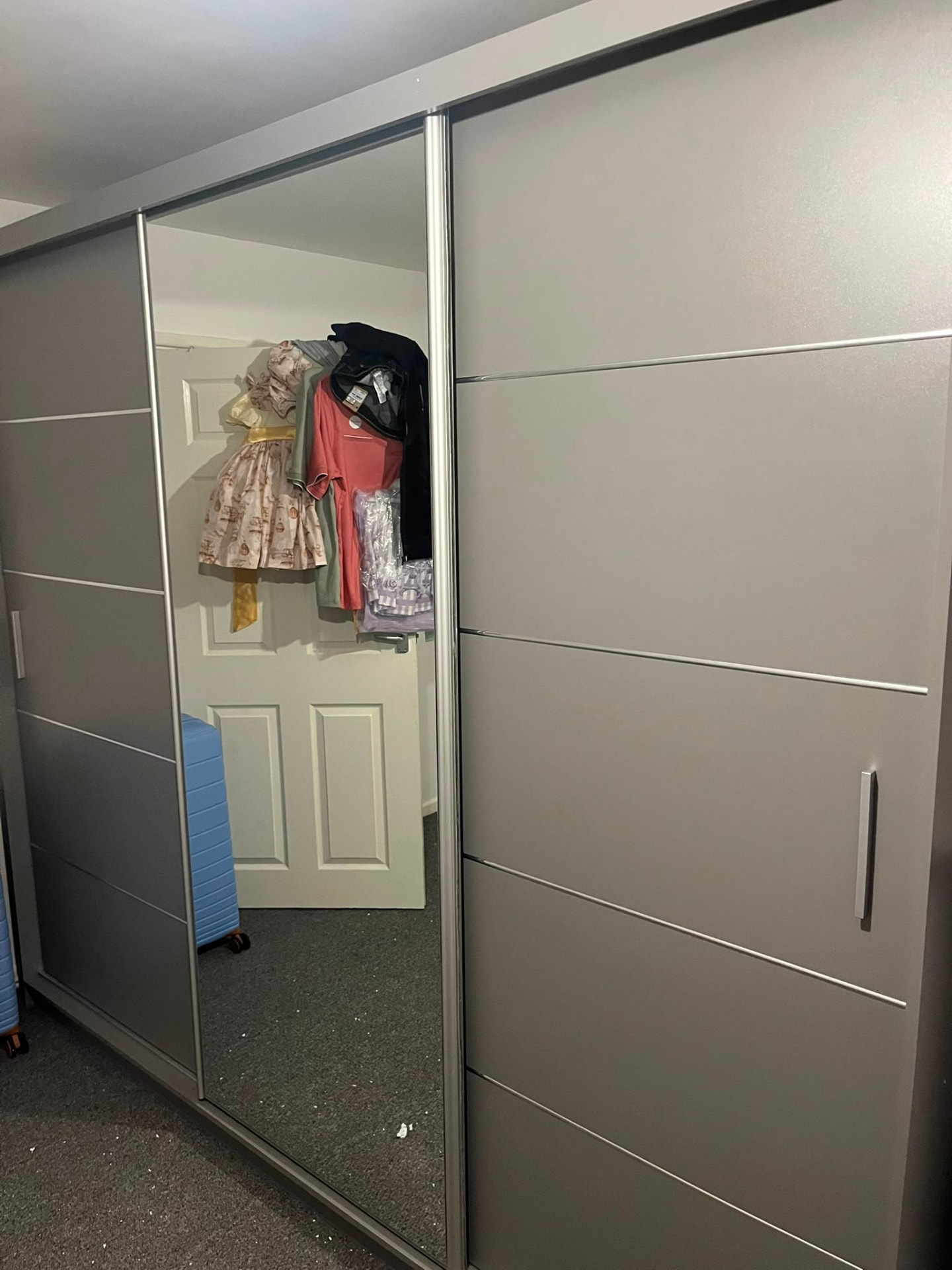 Completed grey sliding-door wardrobe assembled and fitted — Newport flat-pack assembly