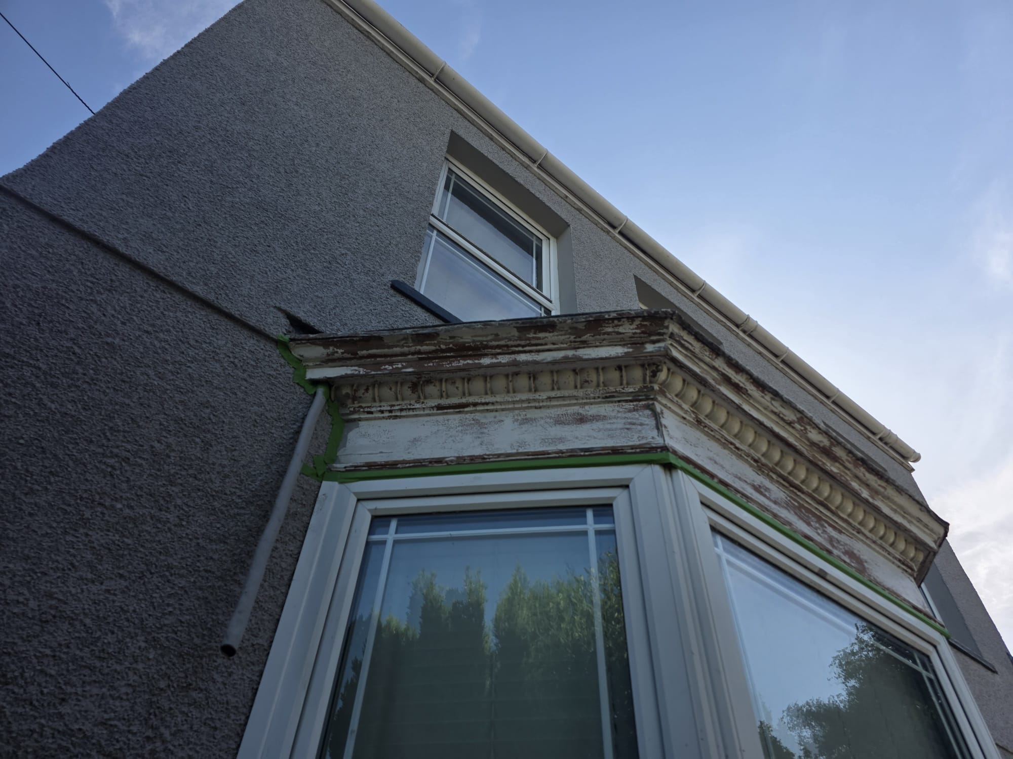 House exterior and windows completed after repaint — Newport